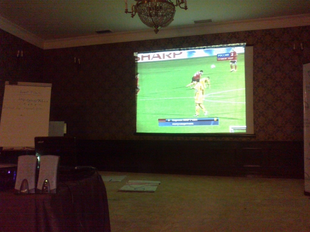 Watching Armenia - Macedonia match on an LCD projector screen in Tbilisi