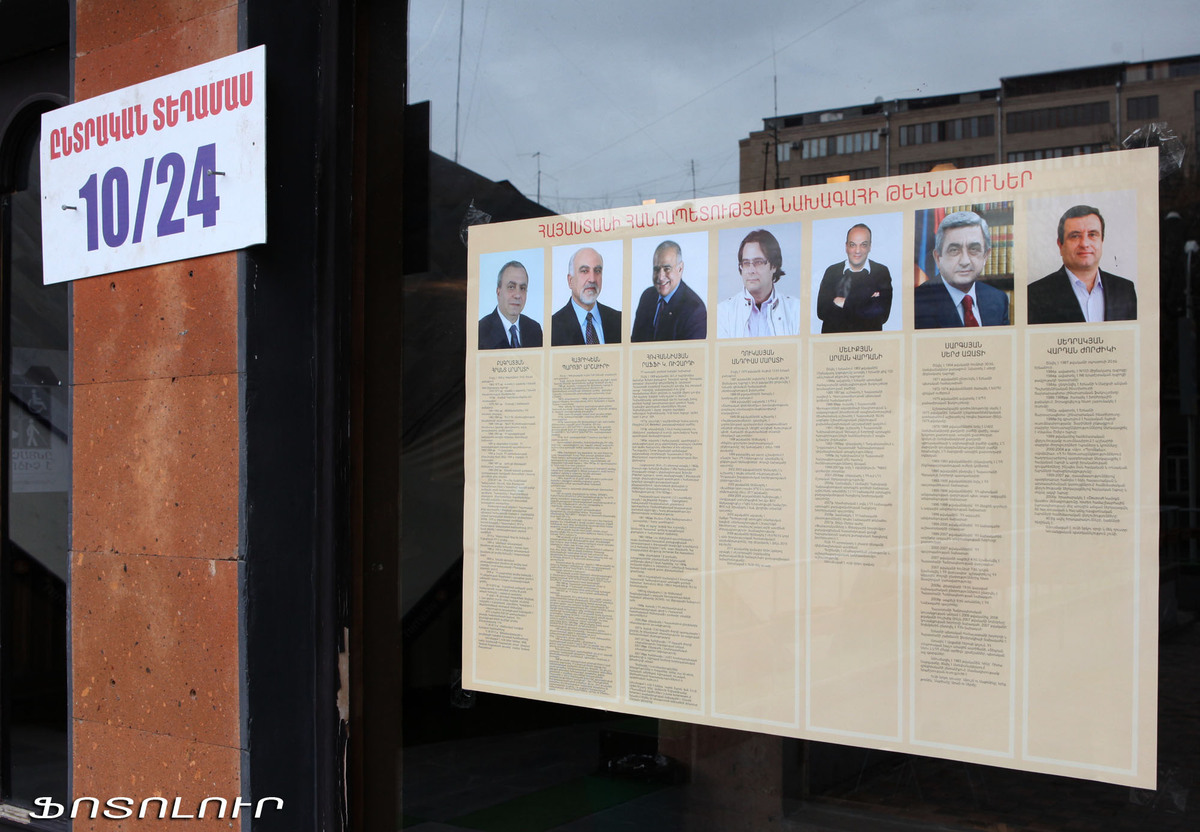Armenia -- Photos of presidential candidates at a polling station ahead of Elections 2013, 17Feb2013 | Photolur photo via Azatutyun.am