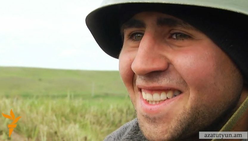 Nagorno-Karabakh -- An Armenian soldier of Karabakh Defense Army smiles after the cease-fire deal is announced, 05Apr2016